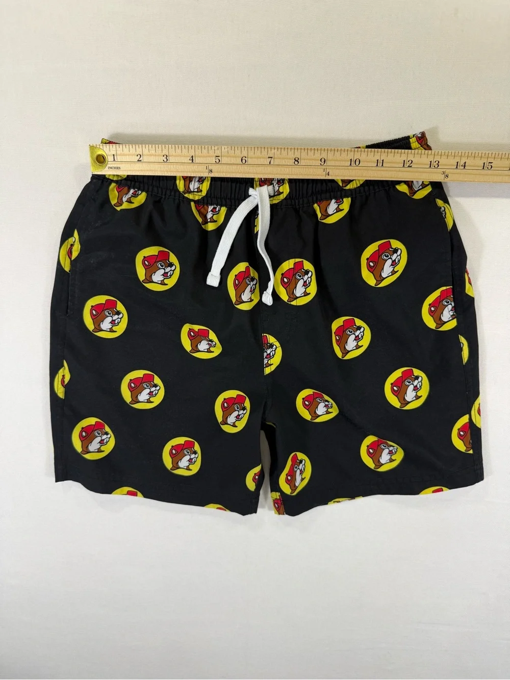 Kids Black Graphic Swim Shorts with Yellow & Red Badge Print